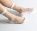 Průhledné ponožky s květy - bílé
